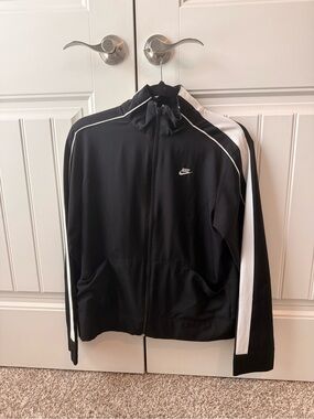 Nike Black Track Jacket with White Stripe Accents